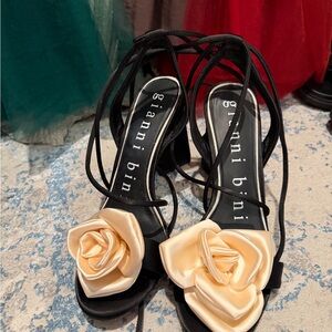 Gianni Bini Black Lace-Up Heels with Cream Rose Appliqués